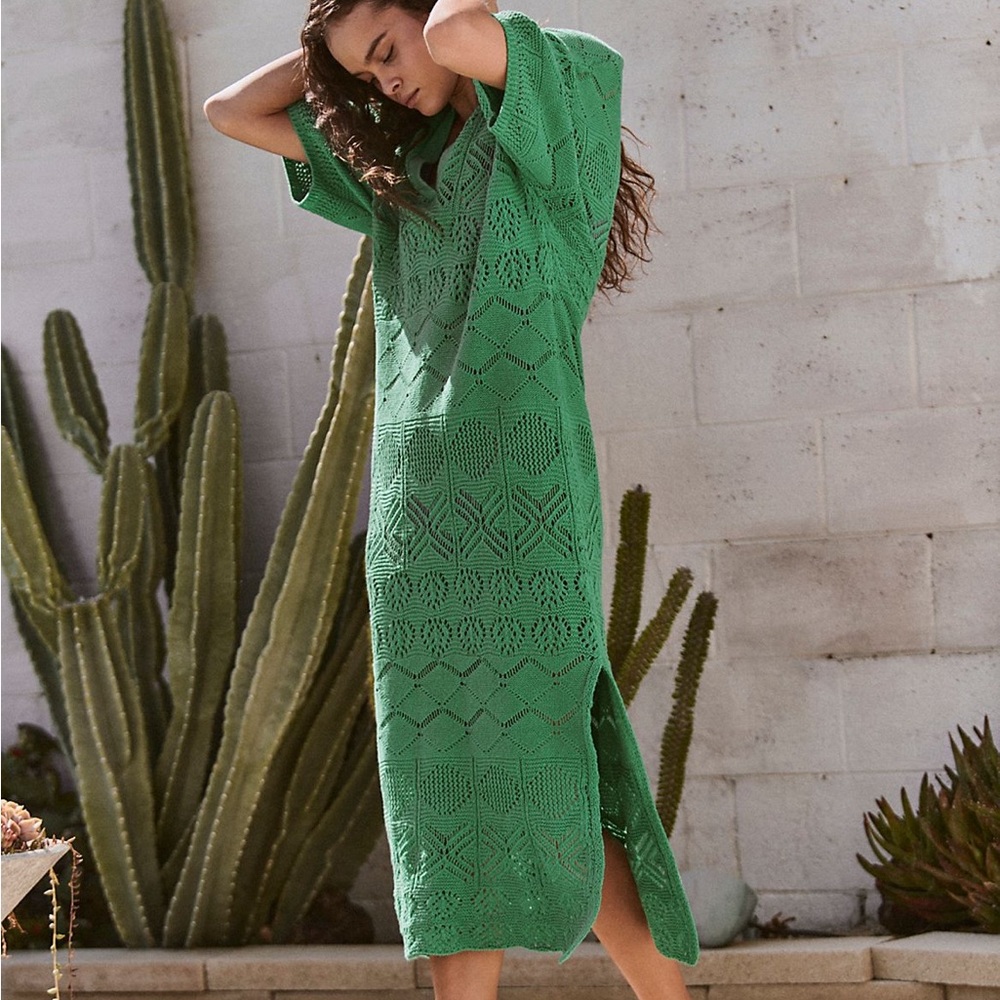 Free people beach cover up. Size XS new with tags. Color is a raisin/brown